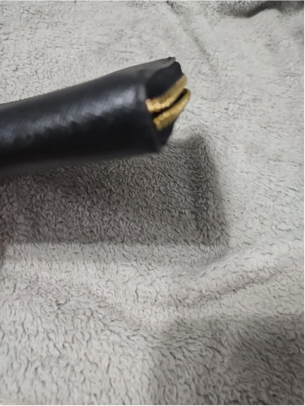 Coach this zip
